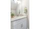Bathroom vanity with granite countertop, stainless steel fixtures, and decorative accents at 98 Linda St, Princeton, NC 27569