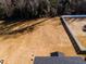Aerial view of the backyard with a partial fence line and open lawn at 370 Fast Pitch Ln, Four Oaks, NC 27524