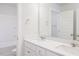 Bathroom featuring dual sinks, quartz countertop, and a shower/tub combination at 370 Fast Pitch Ln, Four Oaks, NC 27524
