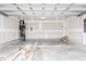 Spacious two car garage with white walls and high ceilings at 370 Fast Pitch Ln, Four Oaks, NC 27524