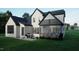 Backyard featuring a grill, seating and an enclosed porch on a modern two-story home at 3612 Bailey Meadows Drive Dr, Wake Forest, NC 27587