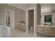 Elegant bathroom with double vanities, modern fixtures, and a separate toilet room for privacy at 3612 Bailey Meadows Drive Dr, Wake Forest, NC 27587