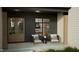 Cozy front porch with stylish seating and natural wood accents on a modern home at 3612 Bailey Meadows Drive Dr, Wake Forest, NC 27587