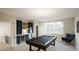 Spacious game room with pool table, wet bar, and ample natural light at 3612 Bailey Meadows Drive Dr, Wake Forest, NC 27587