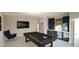 Inviting game room featuring a pool table, bar area, and a large-screen TV at 3612 Bailey Meadows Drive Dr, Wake Forest, NC 27587