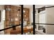 Sunlit home office with built-in bookshelves and French doors to an outdoor balcony at 3612 Bailey Meadows Drive Dr, Wake Forest, NC 27587