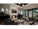 Cozy living room with fireplace and seamless flow to outdoor patio at 3612 Bailey Meadows Drive Dr, Wake Forest, NC 27587