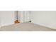 Bedroom showcasing neutral carpeting and multiple doorways at 3604 Drafton Dr, Raleigh, NC 27610