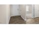 Inviting entryway with wood-look flooring that flows seamlessly into the home's interior at 3604 Drafton Dr, Raleigh, NC 27610