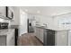 Modern kitchen featuring granite countertops and stainless steel appliances at 3604 Drafton Dr, Raleigh, NC 27610