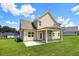 Back of home showcasing a covered patio perfect for entertaining and relaxing outdoors at 51 Blackberry Ln, Benson, NC 27504