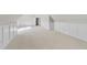 Spacious bedroom features neutral carpet and white trim at 2506 Silas Peak Ln, Apex, NC 27523