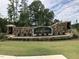 Elegant stone sign for the Ellsworth community with manicured landscaping at 2506 Silas Peak Ln, Apex, NC 27523