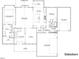 Detailed first-floor plan showing the layout of the main living areas, bedrooms, and garage at 2590 Lassiter Rd, Four Oaks, NC 27524