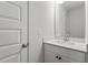 Bathroom featuring a white vanity with white countertop and a modern faucet at 124 August Pond Way # 138, Raleigh, NC 27603