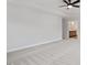 Spacious carpeted bedroom with recessed lighting, and entry to bathroom at 124 August Pond Way # 138, Raleigh, NC 27603