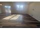 Bright living room with sliding glass doors leading to patio at 1111 Woody Dr, Graham, NC 27253