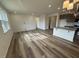 Spacious living room with hardwood floors and natural light at 1111 Woody Dr, Graham, NC 27253