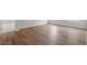 Spacious bedroom with wood-look flooring and ample natural light at 134 Black Walnut Dr # 205, Garner, NC 27529