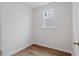Picture of a bedroom with painted walls, wood-look flooring, and a window at 134 Black Walnut Dr # 205, Garner, NC 27529
