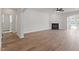 Open-concept living space with fireplace, seamlessly connecting to other areas of the home at 134 Black Walnut Dr # 205, Garner, NC 27529