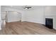 Spacious living room features a fireplace and hardwood floors, ideal for gathering and relaxation at 134 Black Walnut Dr # 205, Garner, NC 27529