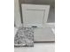 Image showcasing the Ashen White cabinet color options and floor material samples at 134 Black Walnut Dr # 205, Garner, NC 27529