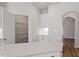 Walk-in pantry with ample shelving and storage space with kitchen quartz countertop island at 134 Black Walnut Dr # 205, Garner, NC 27529