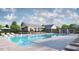 Community pool with lounge chairs and covered seating at 208 Regency Ridge Dr, Holly Springs, NC 27540