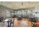 Upscale restaurant interior featuring a bar, table seating, and a decorative ceiling at 208 Regency Ridge Dr, Holly Springs, NC 27540