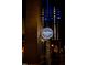 Exterior view of restaurant sign at Townhall Commons with brick and black trim at night at 208 Regency Ridge Dr, Holly Springs, NC 27540