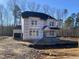 Two-story house under construction, showing the home's exterior features at 5037 Trotter Dr, Raleigh, NC 27603