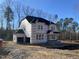 Two-story house under construction, showing the home's exterior features at 5037 Trotter Dr, Raleigh, NC 27603