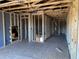 Unfinished upper floor framing with open space and visible structure at 5037 Trotter Dr, Raleigh, NC 27603