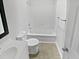 Clean bathroom with a shower and tub combination and tile flooring at 104 Mossbark Ln, Chapel Hill, NC 27514