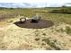 Inviting fire pit area in the backyard with comfortable seating for entertaining at 116 Bristow Ct # 49, Four Oaks, NC 27524