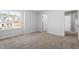 Bright bedroom with carpet, with outside view through window, and neutral paint creating a welcoming space at 125 Bold Dr, Youngsville, NC 27596