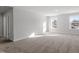 Bright bonus room with neutral carpet and natural light at 125 Bold Dr, Youngsville, NC 27596