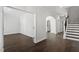 Hallway with hardwood floors leading to the living and dining room at 125 Bold Dr, Youngsville, NC 27596