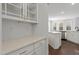 Well-appointed kitchen detail featuring white cabinets, quartz countertops, subway tile backsplash, and stainless steel appliances at 125 Bold Dr, Youngsville, NC 27596