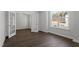 Office with hardwood floors, window, and double doors at 125 Bold Dr, Youngsville, NC 27596