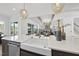 Bright, open kitchen with an island, farmhouse sink, and stylish pendant lighting at 4800 Lakemont Dr, Raleigh, NC 27609