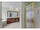 Bathroom features a large vanity, soaking tub and walk-in shower at 7220 Dime Dr, Raleigh, NC 27606