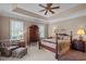 Spacious bedroom with a large bed and ample natural light at 7220 Dime Dr, Raleigh, NC 27606