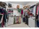 Large walk-in closet with ample shelving and hanging space at 7220 Dime Dr, Raleigh, NC 27606