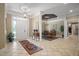 Bright entryway with tile flooring and views to dining room at 7220 Dime Dr, Raleigh, NC 27606
