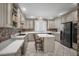 Kitchen with island, ample cabinetry, and workspace at 7220 Dime Dr, Raleigh, NC 27606