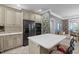 Kitchen with stainless steel appliances and an island breakfast bar at 7220 Dime Dr, Raleigh, NC 27606