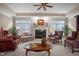 Spacious living room with fireplace and comfortable seating at 7220 Dime Dr, Raleigh, NC 27606