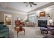 Living room with fireplace, and views into dining room at 7220 Dime Dr, Raleigh, NC 27606